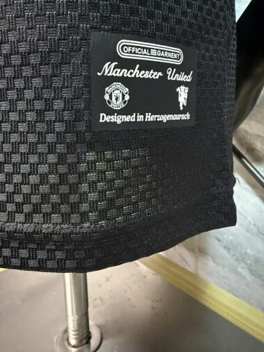 Manchester United 2025/26 Black Polo Player Version