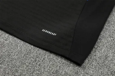 Ropa de entrenamiento del Manchester United 2025/26, negra, con media cremallera