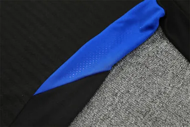 Ropa de entrenamiento del Manchester United 2025/26, negra, con media cremallera