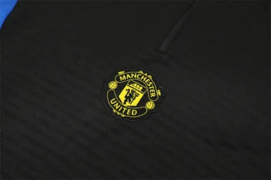 Ropa de entrenamiento del Manchester United 2025/26, negra, con media cremallera