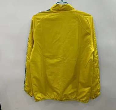Giacca a vento reversibile blu e gialla Arsenal 25-26