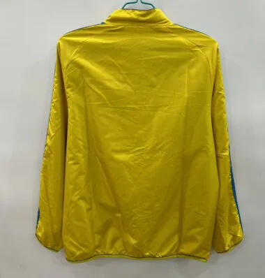 25-26 Real Madrid yellow and blue reversible windbreaker