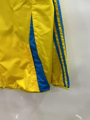 25-26 Real Madrid yellow and blue reversible windbreaker