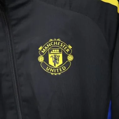 Manchester United 2025/26 Black Windbreaker