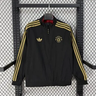 Casaco reversível do Manchester United 2026/27, preto e vermelho, para o Ano Novo