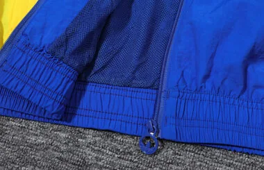 24-25 Boca blue windbreaker suit