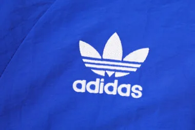 24-25 Boca blue windbreaker suit