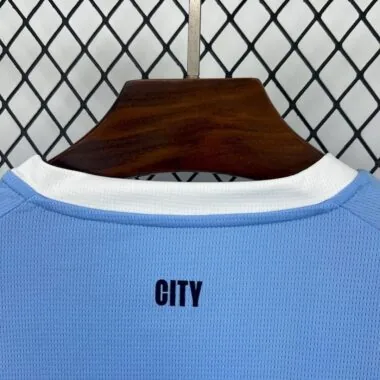 Maillot femme domicile de Manchester City, tailles 25-26
