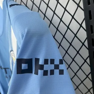 Maillot femme domicile de Manchester City, tailles 25-26
