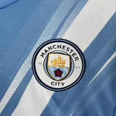 Maillot femme domicile de Manchester City, tailles 25-26