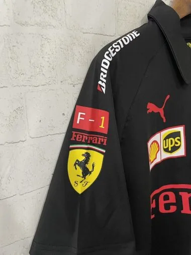 Polo Ferrari F1 nera 2025 (taglie S-3XL)