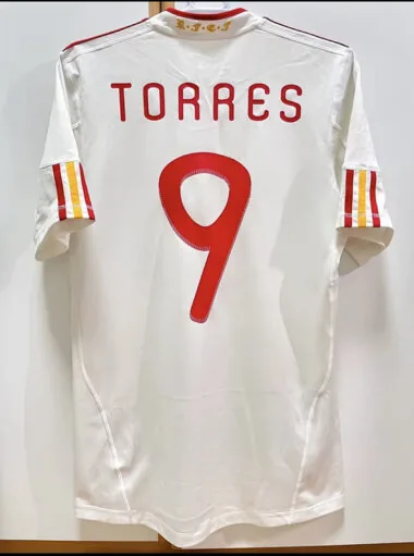 Camiseta retro de la selección de España para partidos fuera de casa, temporada 11-12