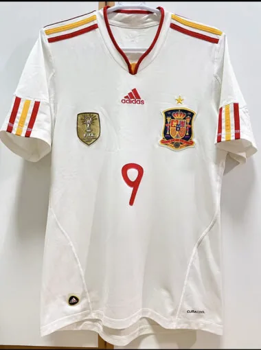 Camiseta retro de la selección de España para partidos fuera de casa, temporada 11-12