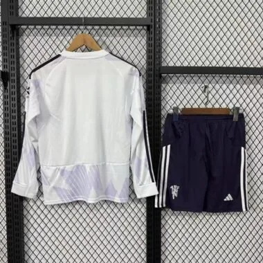 Equipación infantil de manga larga para partidos fuera de casa del Manchester United, temporada 2025/26