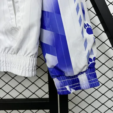 Veste coupe-vent réversible bleu et blanc du Real Madrid, 24-25