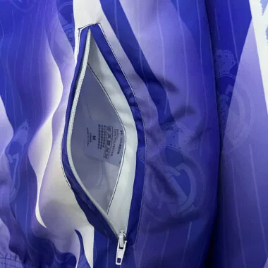 Veste coupe-vent réversible bleu et blanc du Real Madrid, 24-25