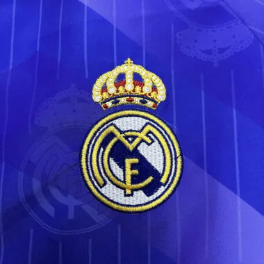 Veste coupe-vent réversible bleu et blanc du Real Madrid, 24-25
