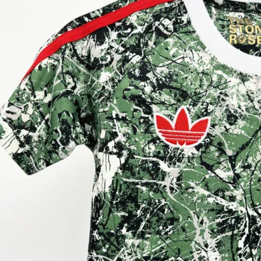 Equipamento infantil verde do Manchester United, edição especial 24-25