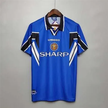 96-98 Terceiro equipamento azul de fora do Manchester United