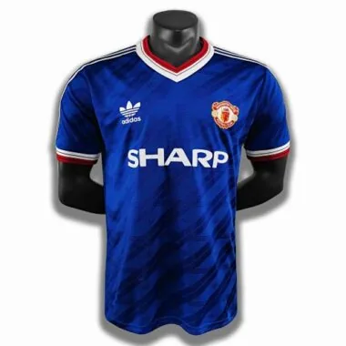 86-88 Manchester United, fora de casa, versão azul dos jogadores