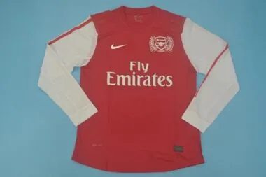 11-12 Tipos de letra do Arsenal em casa na Liga dos Campeões