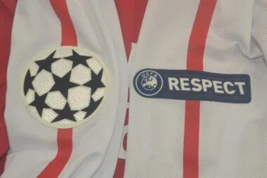 11-12 Arsenal home UCL fonts