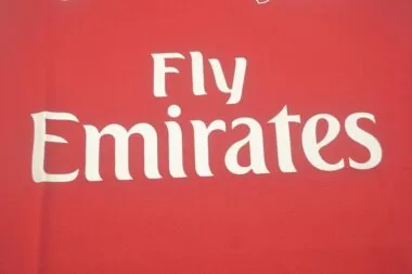 11-12 Arsenal home UCL fonts
