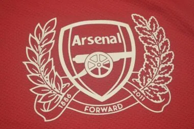 11-12 Arsenal home UCL fonts