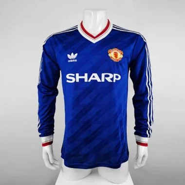 Camisa azul de manga comprida do Manchester United para jogos fora de casa, 86-88
