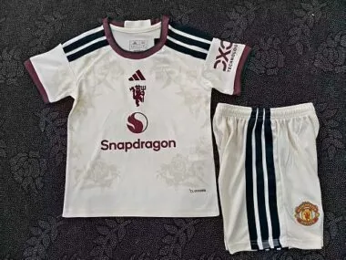Equipamento infantil de terceira escolha para jogos fora de casa do Manchester United 2026/27 (Tamanhos 16-28)